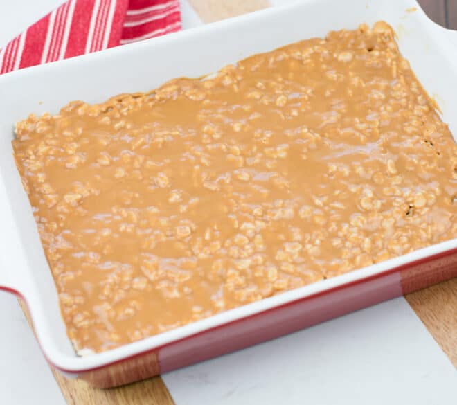 melted caramels spread on top of rice Krispie treats