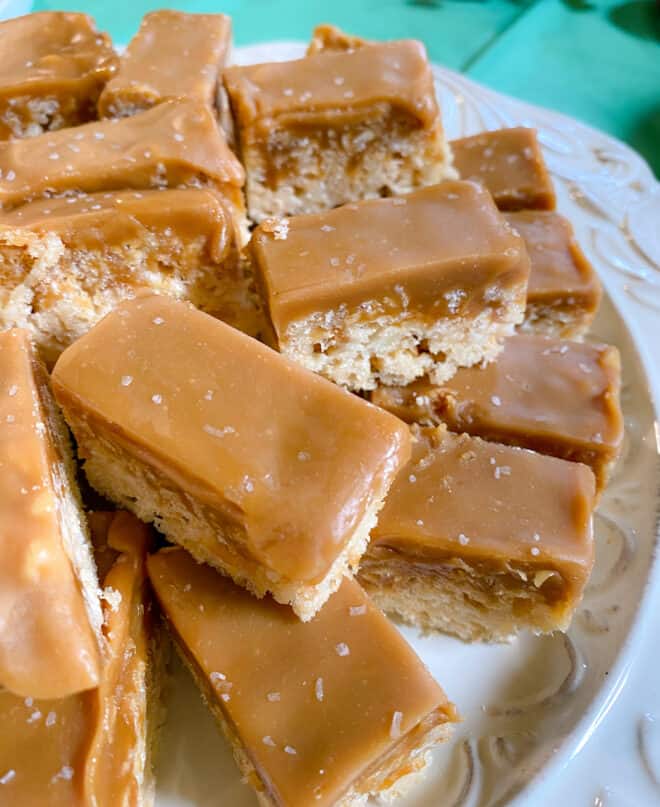 salted caramel Rice Krispie bars on a white serving platter