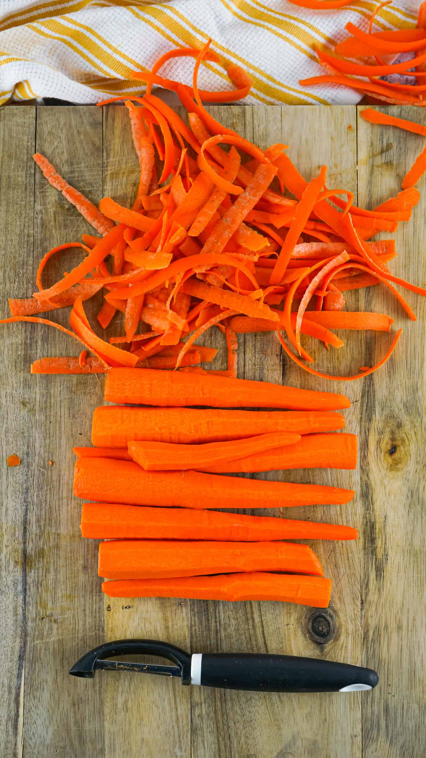 peeled carrots on cutting board