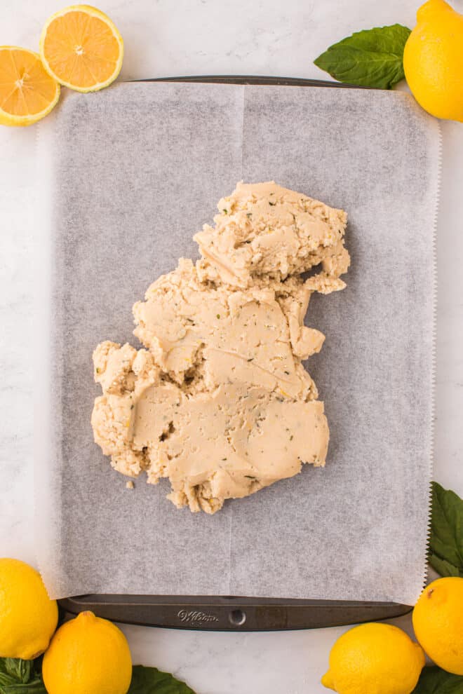 soft cookie dough on a parchment lined cookie sheet