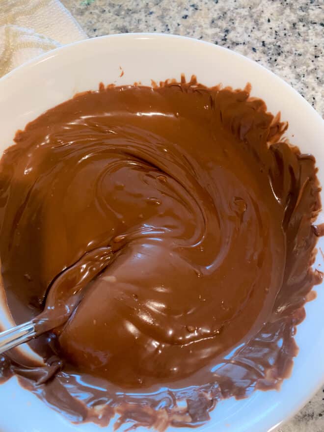 melted chocolate chips in a white bowl