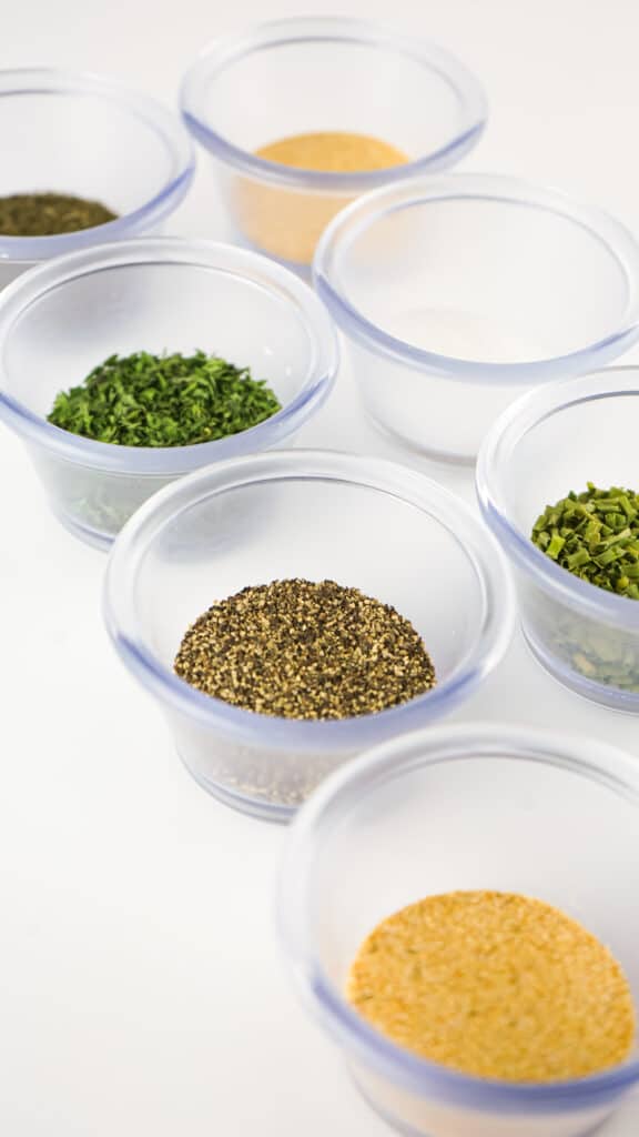 seasonings for ranch seasoning measured and placed in small glass jars