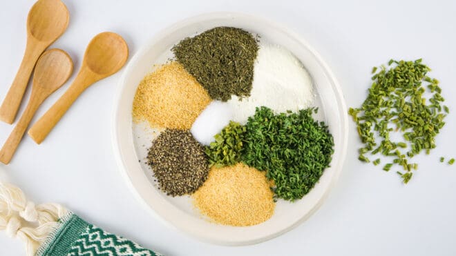 ranch dressing mix ingredients in a white bowl before combining all the spices