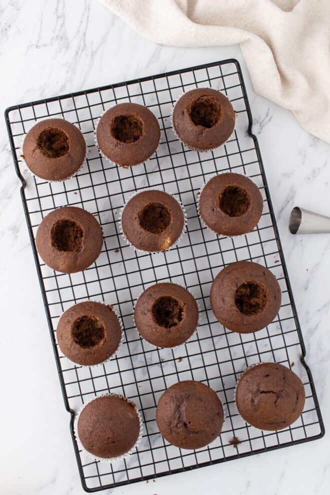 baked chocolate cupcakes with the middle removed to add nutella