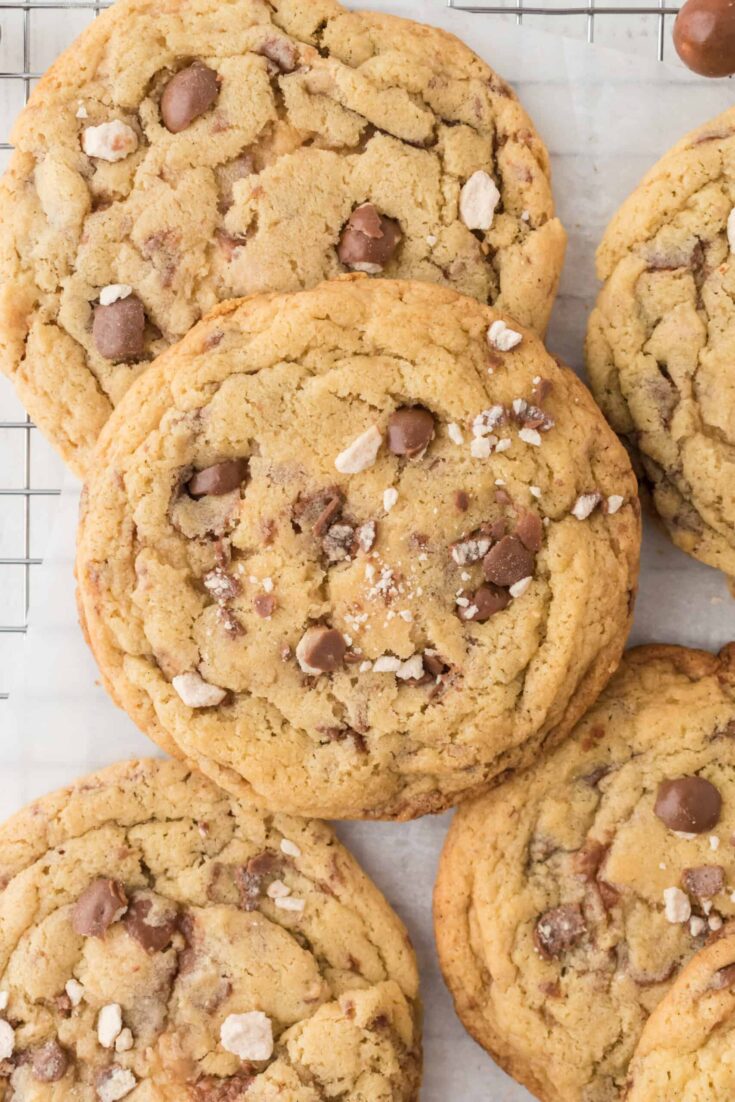 Malted Milk Ball Cookies With Toffee Bits on a wire cooling rack