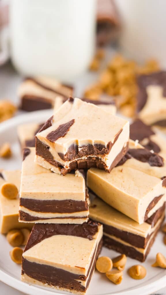 Chocolate Peanut Butter Fudge piled high on a platter