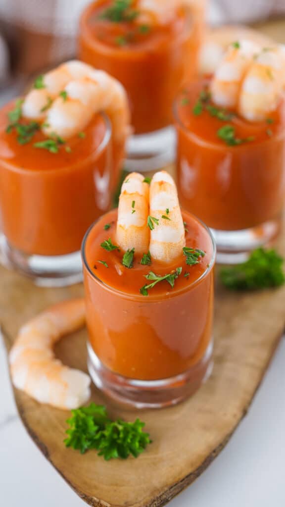 serving suggestion - shrimp cocktails garnished with fresh parsley