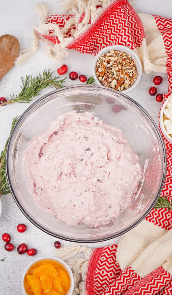 cranberry and whipped topping mixed together in a bowl