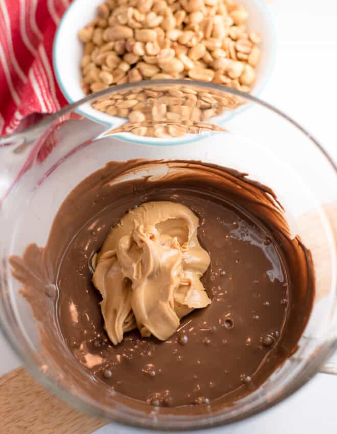 Add peanut butter to melted chocolate in glass bowl