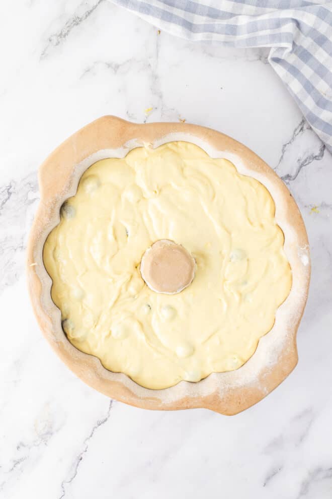 Lemon Blueberry Cake Batter in bundt pan ready to bake