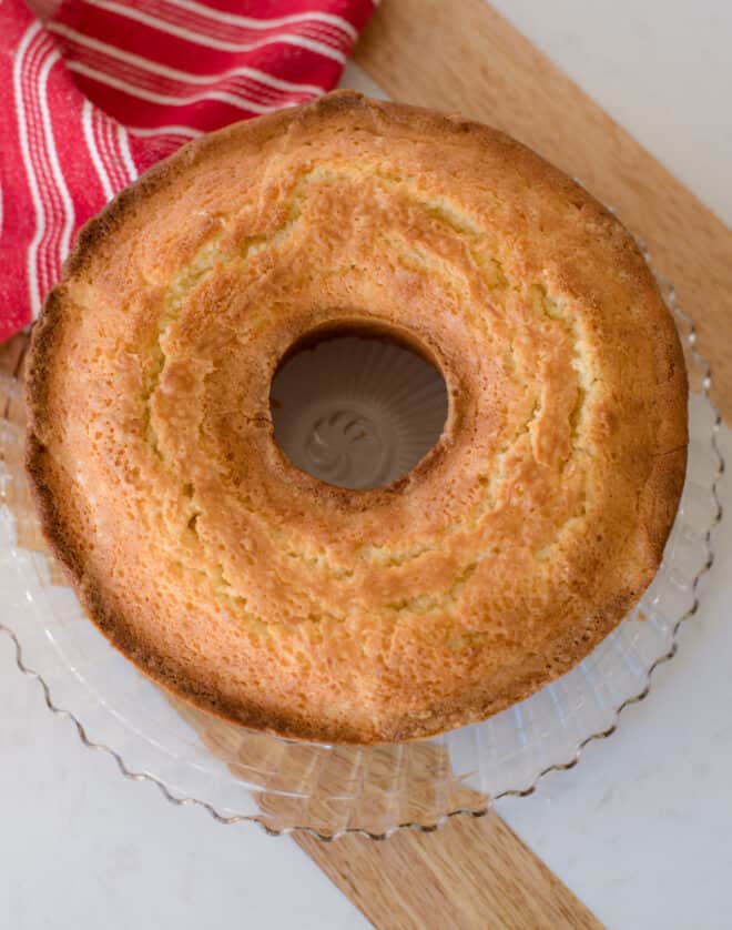 Pineapple Pound Cake without glaze on a clear glass cake plate