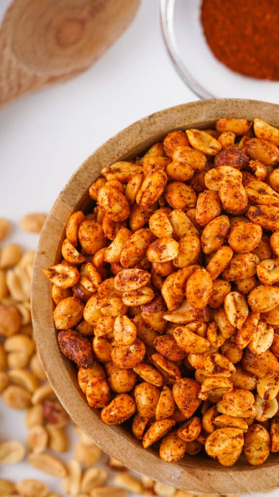 spicy peanuts in a brown serving bowl