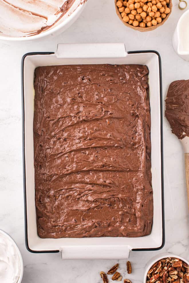 chocolate cake mix spread into 13x9 cake pan