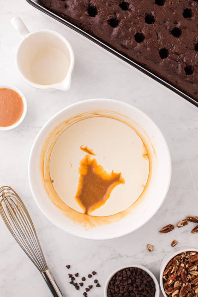 caramel sauce and heavy whipping cream in a bowl