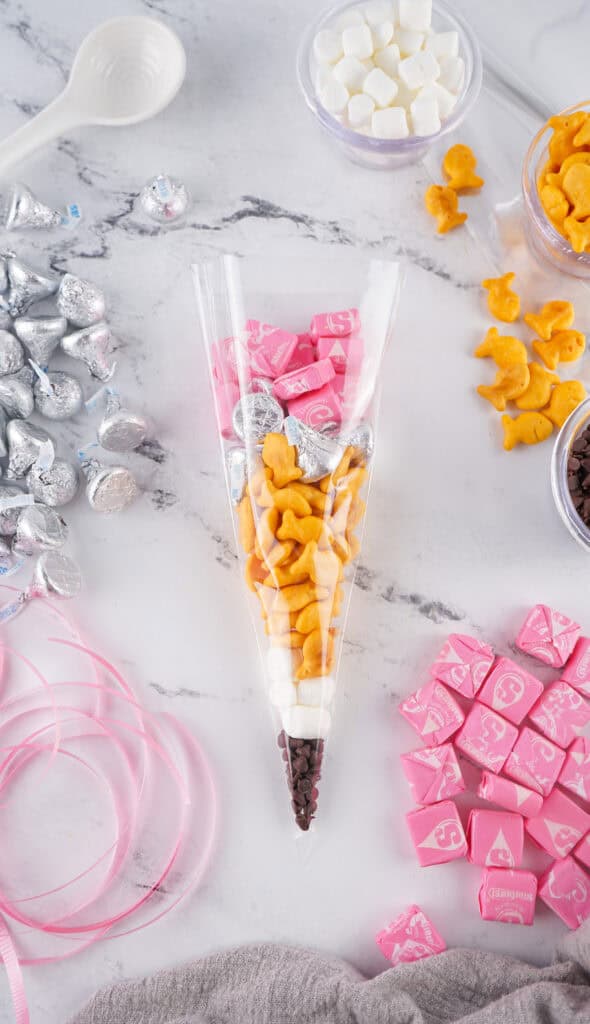 pink starburst added to pencil treat bag