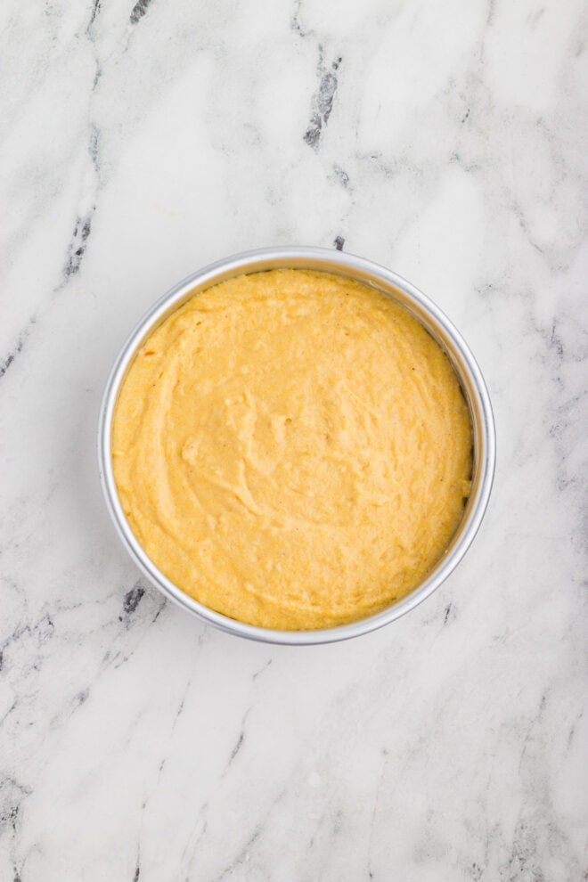 cornbread ingredients mixed together and placed in an 8-in cake pan