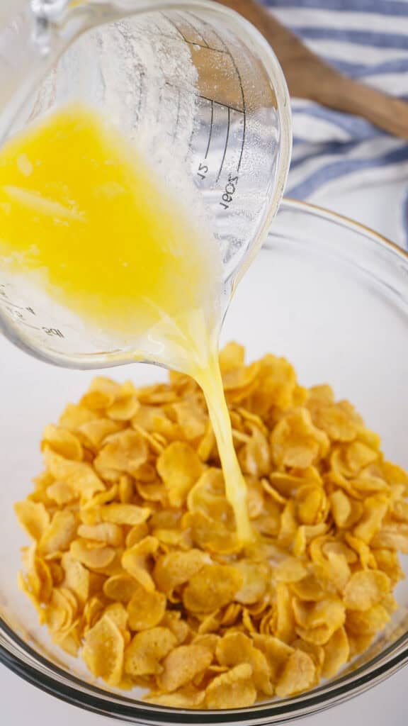 melted butter added to cornflakes before placing in the oven to crisp up. This will be the topping for crockpot funeral potatoes