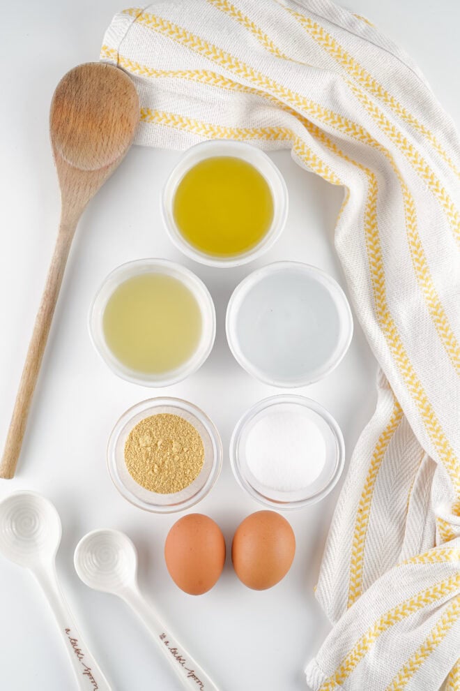 Ingredients Needed to Make Homemade Mayonnaise - including olive oil, eggs, salt, vinegar, lemon juice.