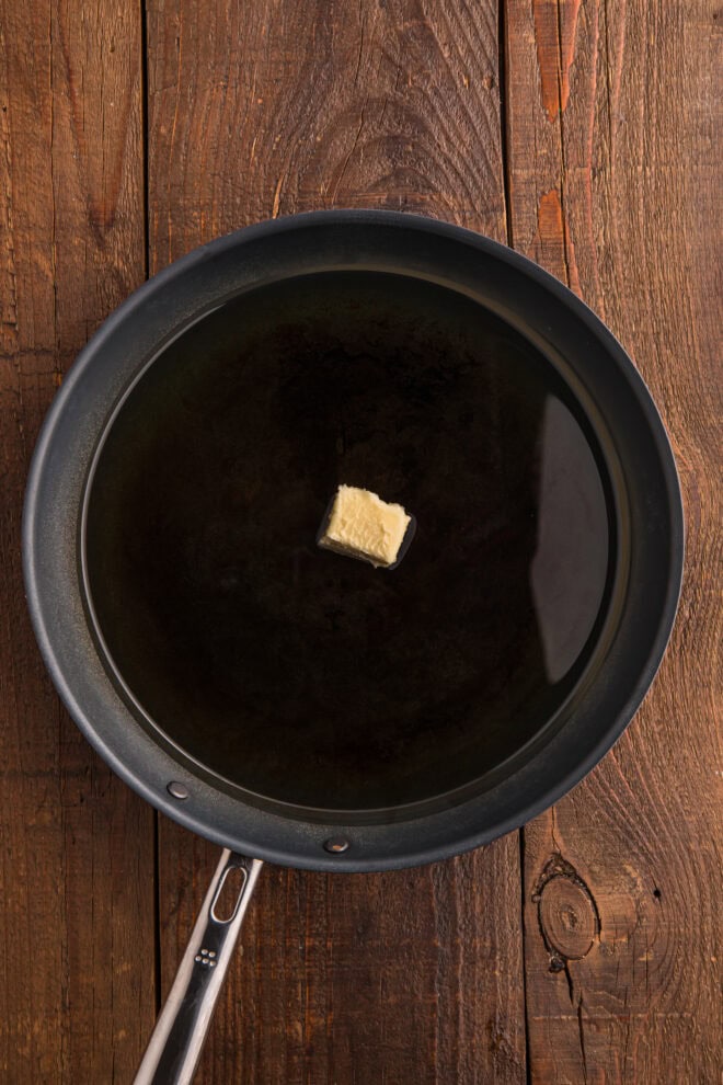 Oil and butter being heated in a skillet