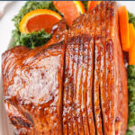 honey baked ham with text overlay for Pinterest