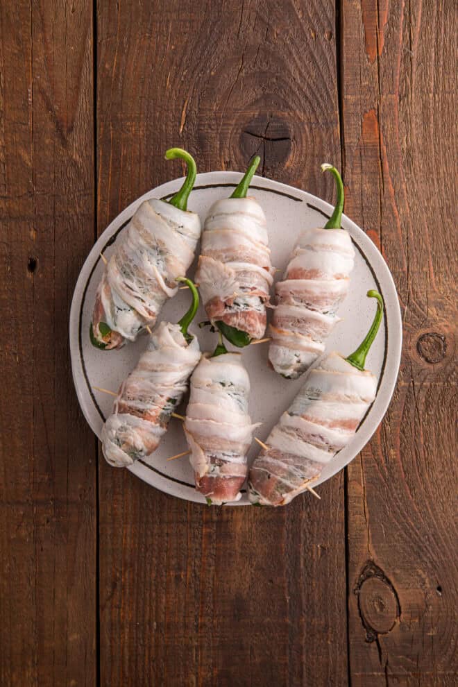 Jalapeno Poppers wrapped in bacon and ready to grill