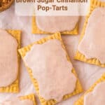 overhead photo of brown sugar cinnamon pop-tarts on parchment paper with an overlay title for pinterest pin