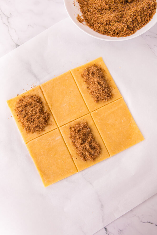 brown sugar cinnamon filling placed on dough rectangles